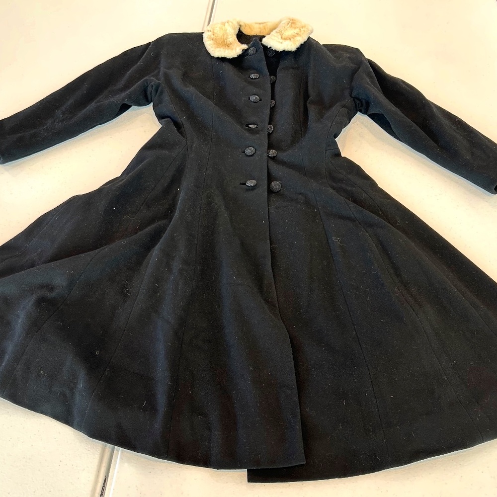 3/4 sleeve or “bracelet length” coat by John T. Shayne